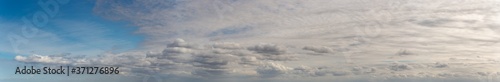 Fantastic soft clouds against blue sky, natural composition © StepStock