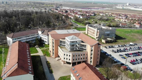 Aerial Drone Shot over Universitatea Oradea Campus library parking big building with students photo