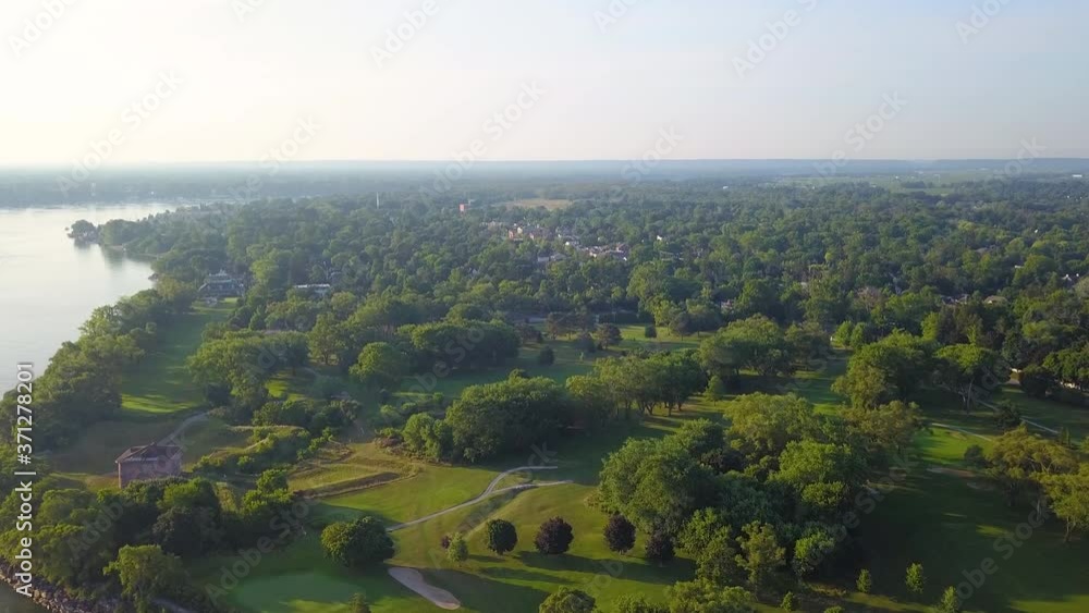 Gorgeous early morning aerial flying over a scenic small town. Gorgeous early morning aerial flying over a scenic small town.