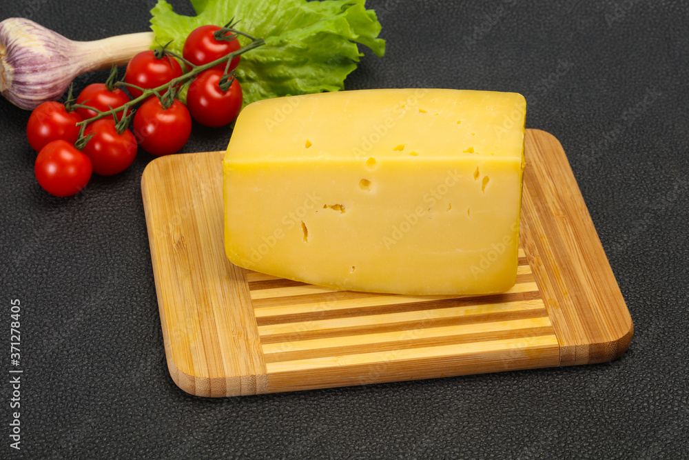 Hard yellow tasty cheese brick Hard yellow tasty cheese brick