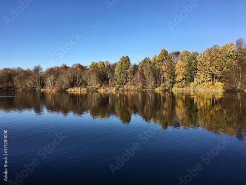 A view of Alderford lake in Shropshire with reflection