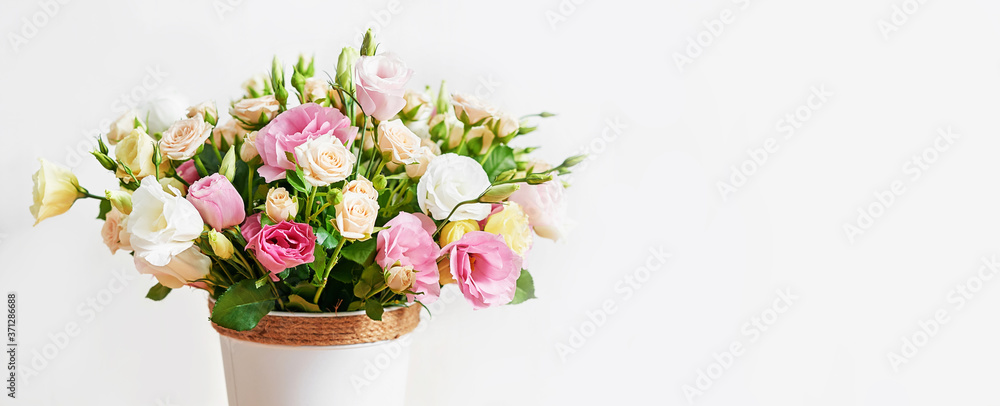 Flowers for women's day. Mother's day greeting card. Bouquet of flowers eustoma and roses in vase. Happy Birthday! Valentine's day gift. 14 February. I love you concept. Flower delivery. Flower shop Flowers for women's day. Mother's day greeting card. Bouquet of flowers eustoma and roses in vase. Happy Birthday! Valentine's day gift. 14 February. I love you concept. Flower delivery. Flower shop