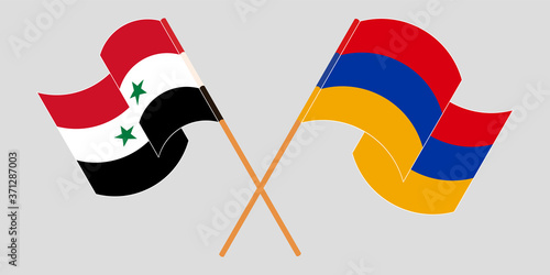 Crossed and waving flags of Syria and Armenia