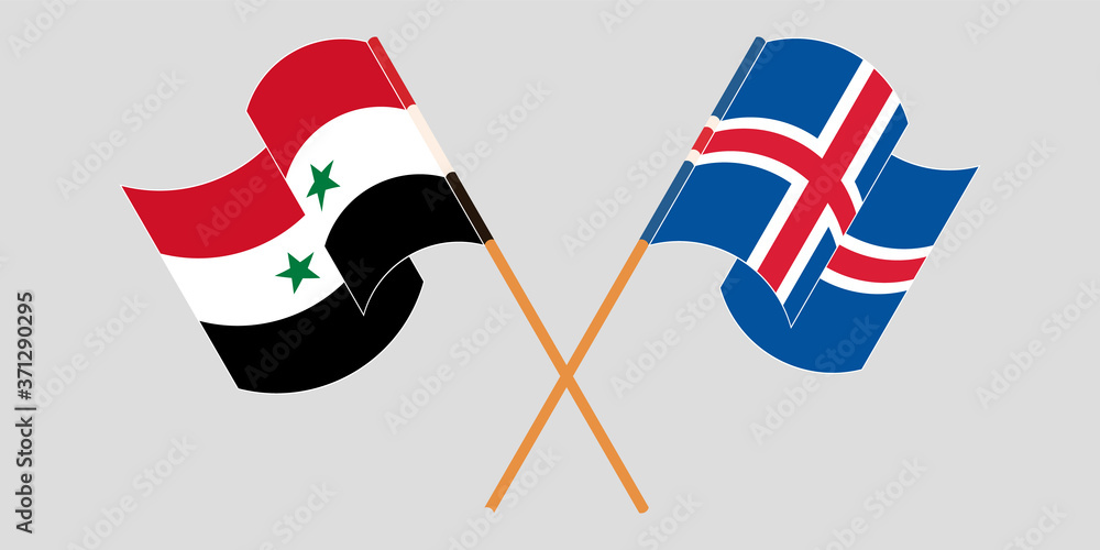 Crossed and waving flags of Syria and Iceland
