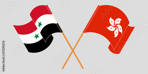 Crossed and waving flags of Syria and Hong Kong
