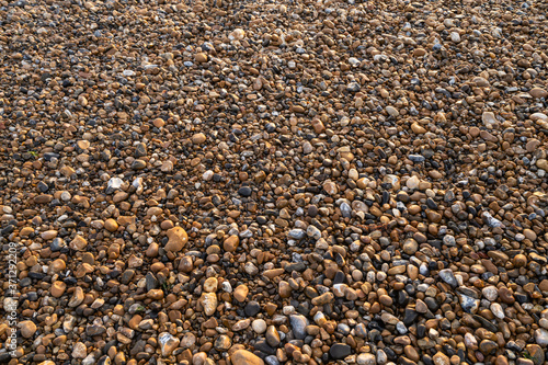 Multi coloured pebbles on the beach