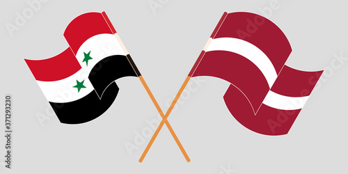 Crossed and waving flags of Syria and Latvia