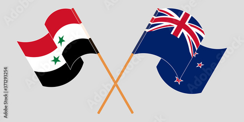 Crossed and waving flags of Syria and New Zealand