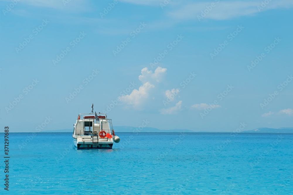 Motor boat on roadstead near Zakynthos island in Greece