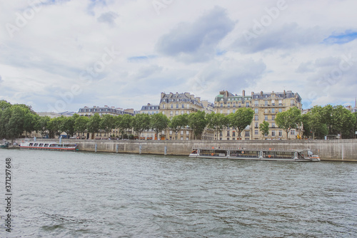embankment along the Seine river, panoramic view of Paris