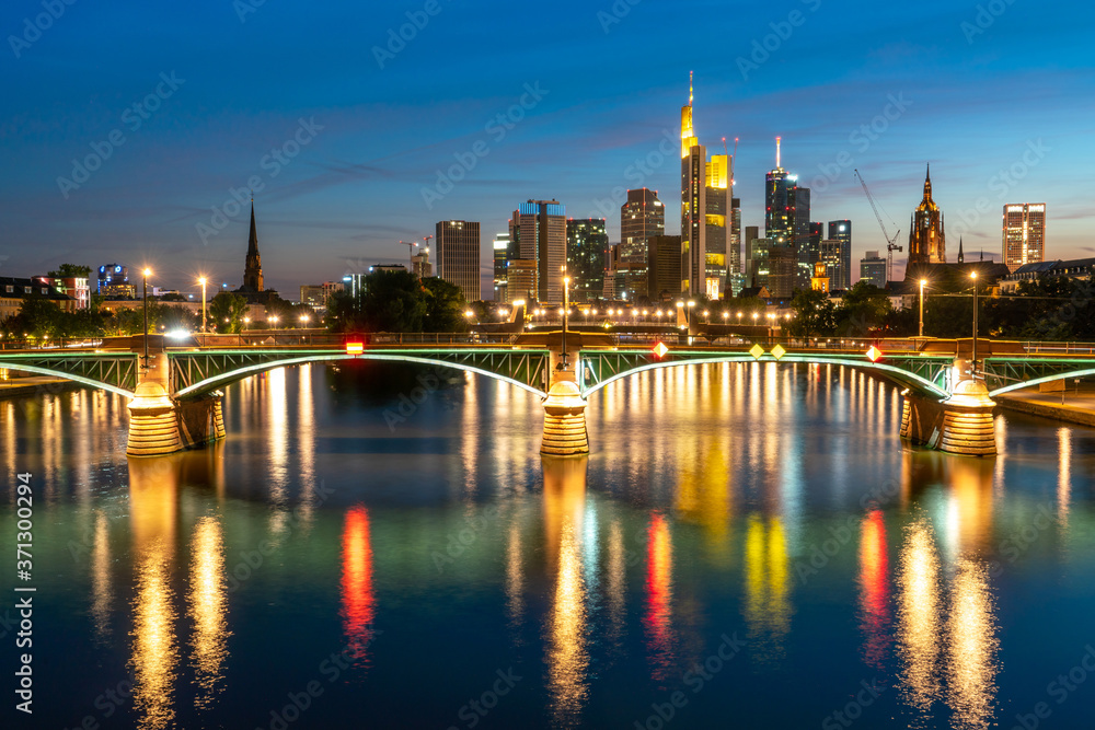 Fototapeta premium Frankfurt am Main Illuminated financial and office district in Frankfurt am Main in Germany at twilight