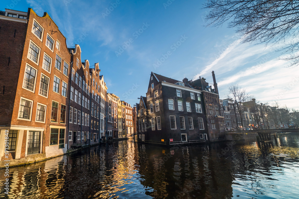 Amsterdam Netherlands dancing houses over river Amstel landmark in old european city