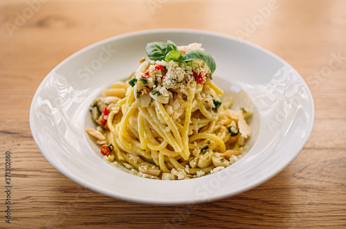 Spaghetti aglio olio e peperoncino. Italian vegetable pasta. photo