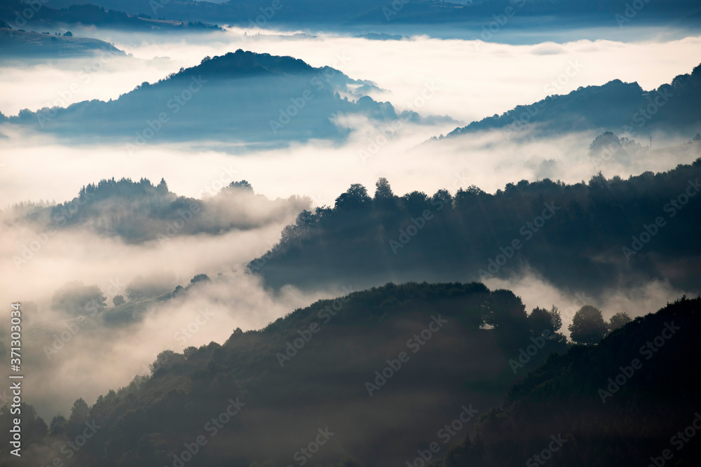 Magic sunrise in a Carpathian mountain valley