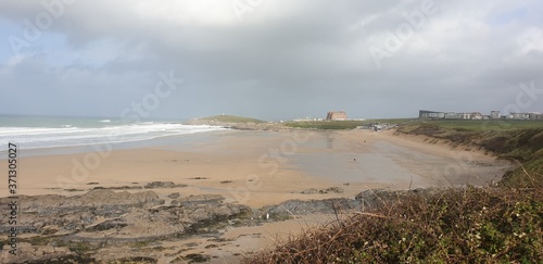 Sandy Cornish beach during a windy and wintery British season