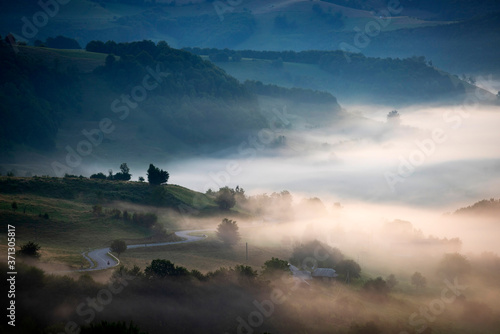 Magic sunrise in a Carpathian mountain valley