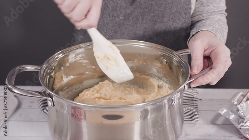 Wallpaper Mural Step by step. Melting white chocolate chips in the cooking pot to make candy cane white chocolate fudge. Torontodigital.ca