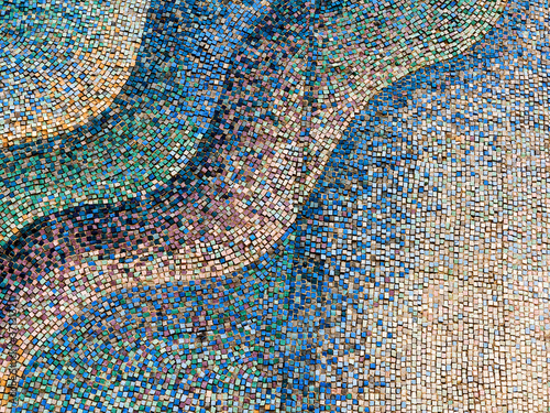 Detail of beautiful old collapsing abstract ceramic mosaic adorned building. Venetian mosaic as decorative background. Selective focus. Abstract Pattern. Abstract mosaic colored ceramic stones