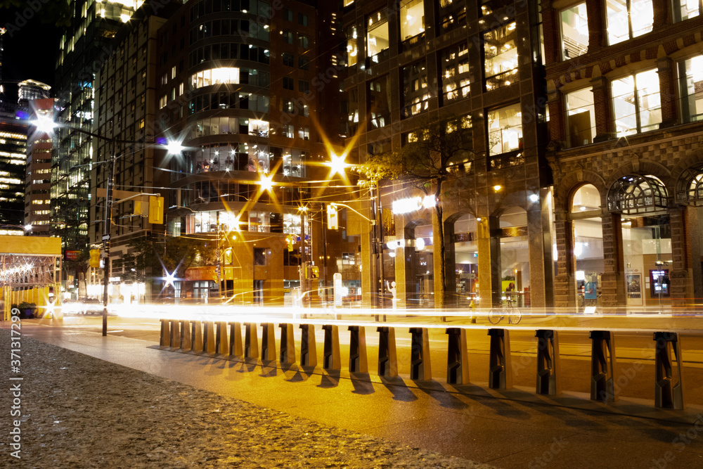 Fototapeta premium Streamed lights in downtown Toronto during evening