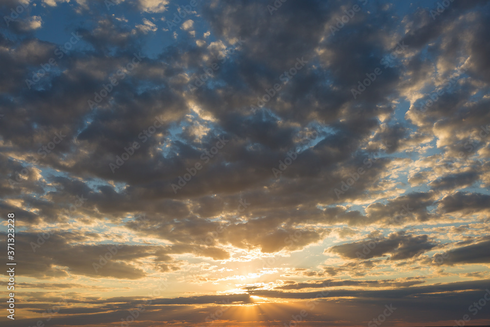 Beautiful atmospheric dramatic clouds in the evening at sunset.