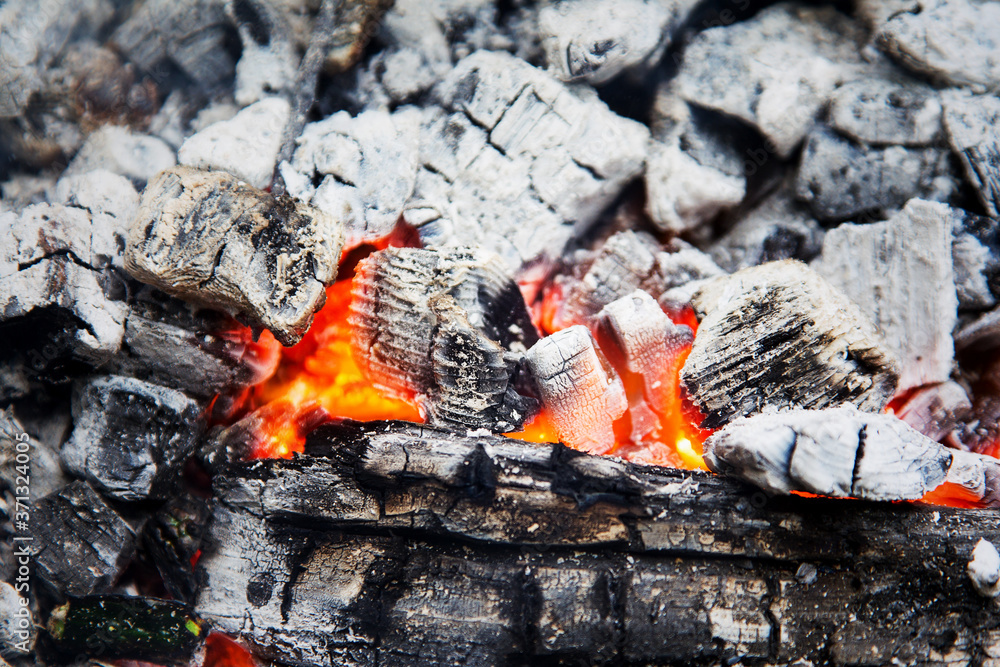 Wooden embers beautifully glowing. Charcoal embers ready for barbecue Wooden embers beautifully glowing. Charcoal embers ready for barbecue