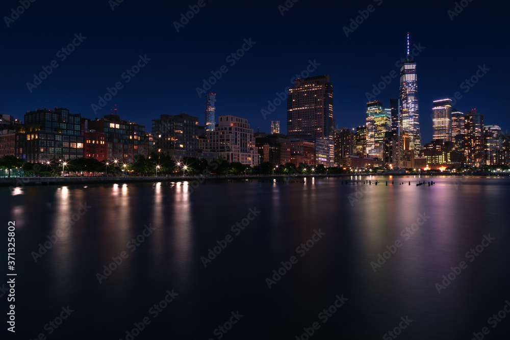 View on Manhattan from Hudson River at dusk with long exposure