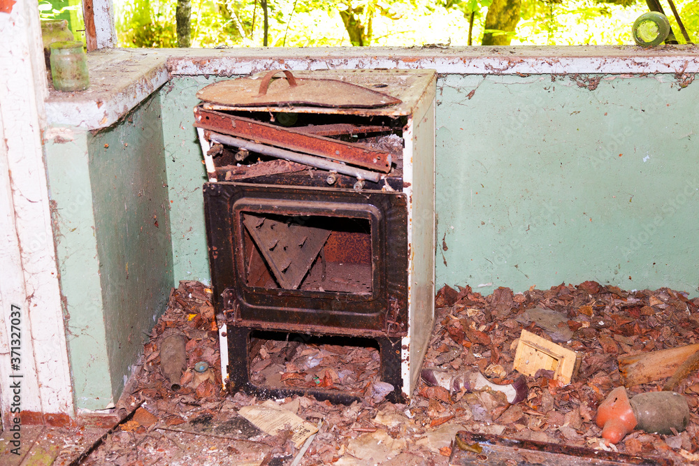 Abandoned House Interior In Chernobyl.Chernobyl radioactive contamination. Consequences of looting and vandalism after an explosion. People left city during disaster Abandoned House Interior In Chernobyl.Chernobyl radioactive contamination. Consequences of looting and vandalism after an explosion. People left city during disaster