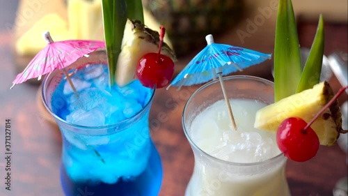 Summer cocktail image, pina colada and blue hawaii