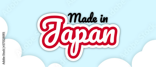 Bold stroke text style "Made in Japan" vector illustration. Text in country flag colours, floating on editable/removable sky with clouds background.