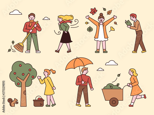 People who enjoy autumn. flat design style minimal vector illustration.