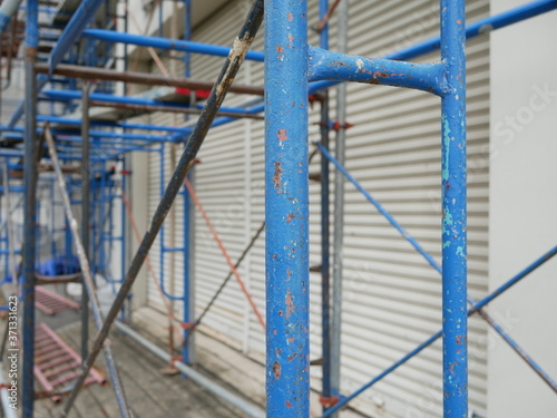 steel scaffolding at construction site with protection.