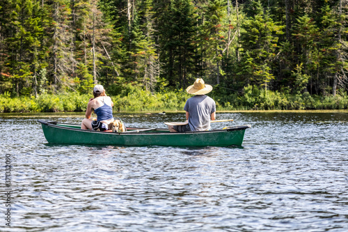 Couple with Beagle Fishing and Birdwatching