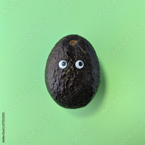 Funny avocado with eyes