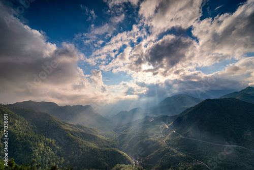 The magical sunset on O Quy Ho mountain pass before sunset. O Quy Ho Mountain Pass (Sapa, Vietnam) is Vietnam's longest mountain pass.