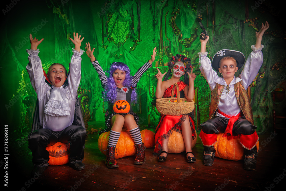 Fototapeta premium scared kids in carnival costumes