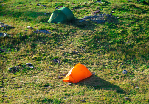 two tents on a field