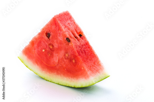 Slice of watermelon isolated on bright background