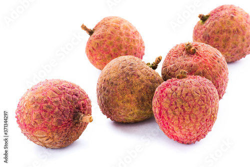 Lychee fruits on white background