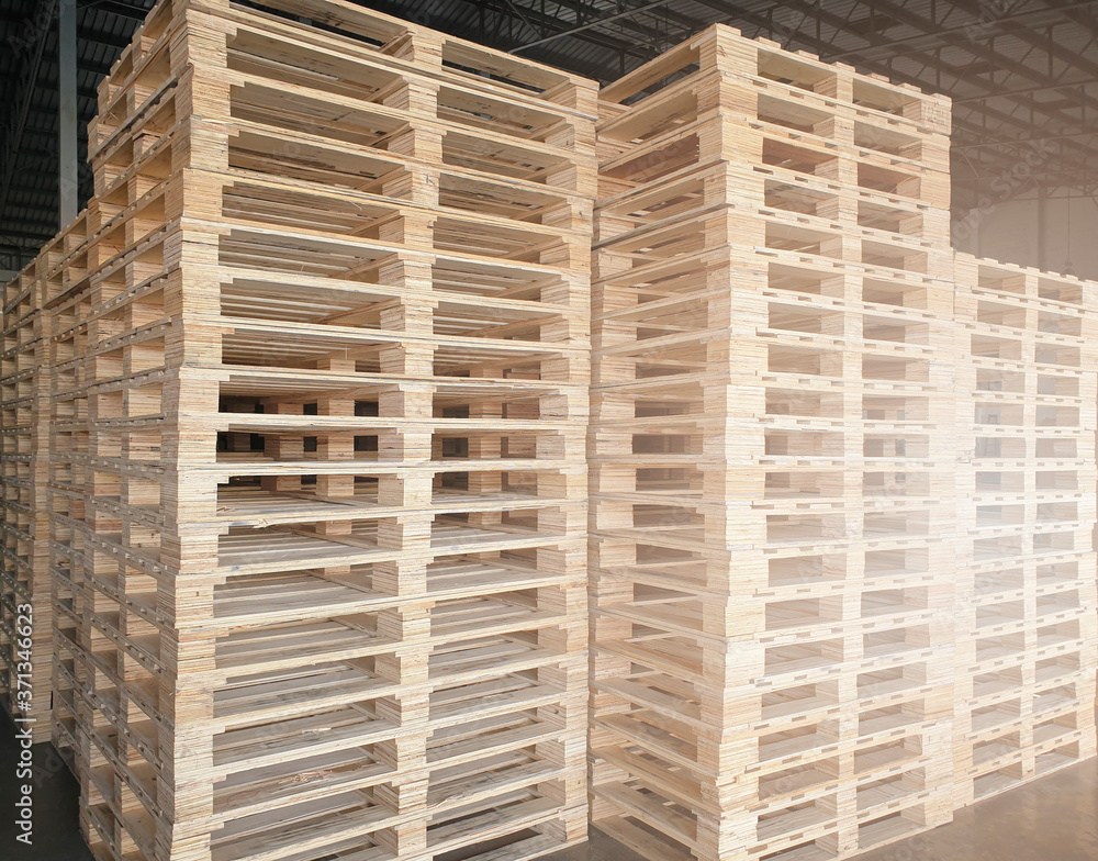 Wooden pallets in stock warehouse. material for industrial cargo freight transport. Wooden pallets in stock warehouse. material for industrial cargo freight transport.