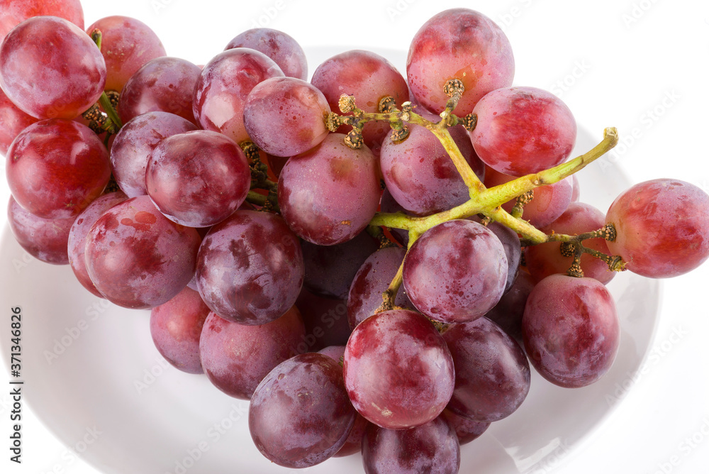 Ripe red grape isolated on white background. Ripe red grape isolated on white background.