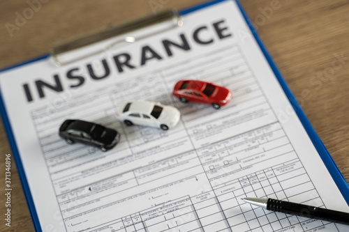 Фотография car incident protective and car insurance policy examining insurance