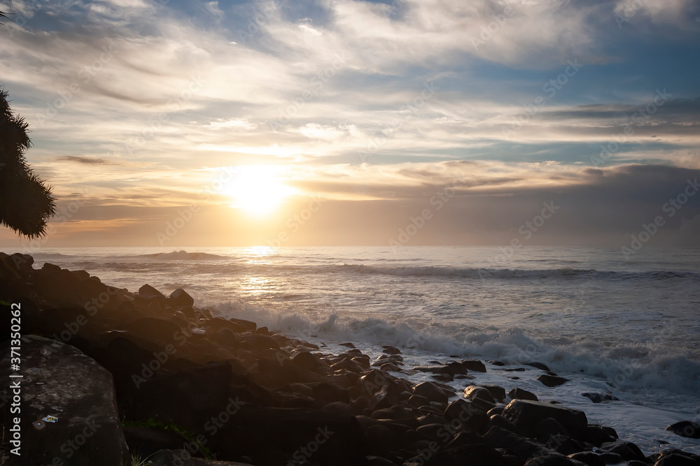 Ocean waves breaking on the rocky beach Ocean waves breaking on the rocky beach