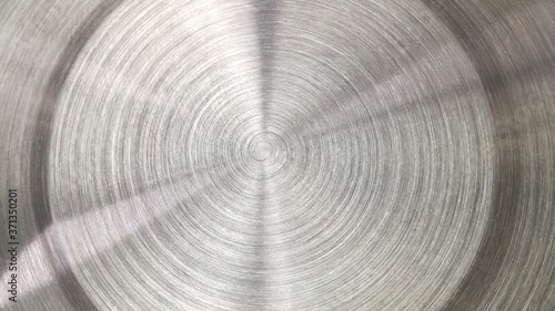 abstract metal background,The stainless steel surface that is polished to a curved, circular or scratched surface.