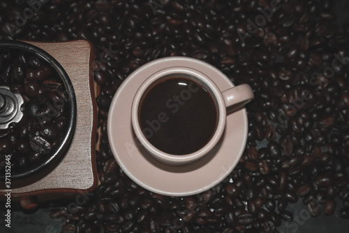 Background of coffee mugs and freshly roasted coffee beans