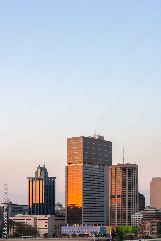 Vertical image of Brisbane city skylines during sunset time Vertical image of Brisbane city skylines during sunset time