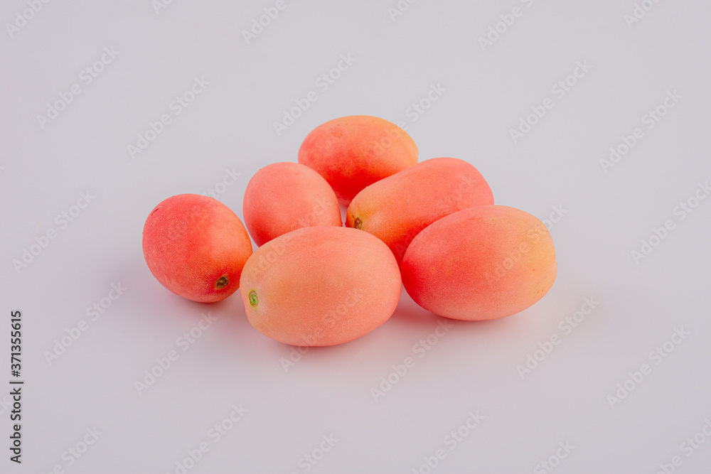 Fresh red Seeda tomatoes on white background, Thai tomatoes Fresh red Seeda tomatoes on white background, Thai tomatoes