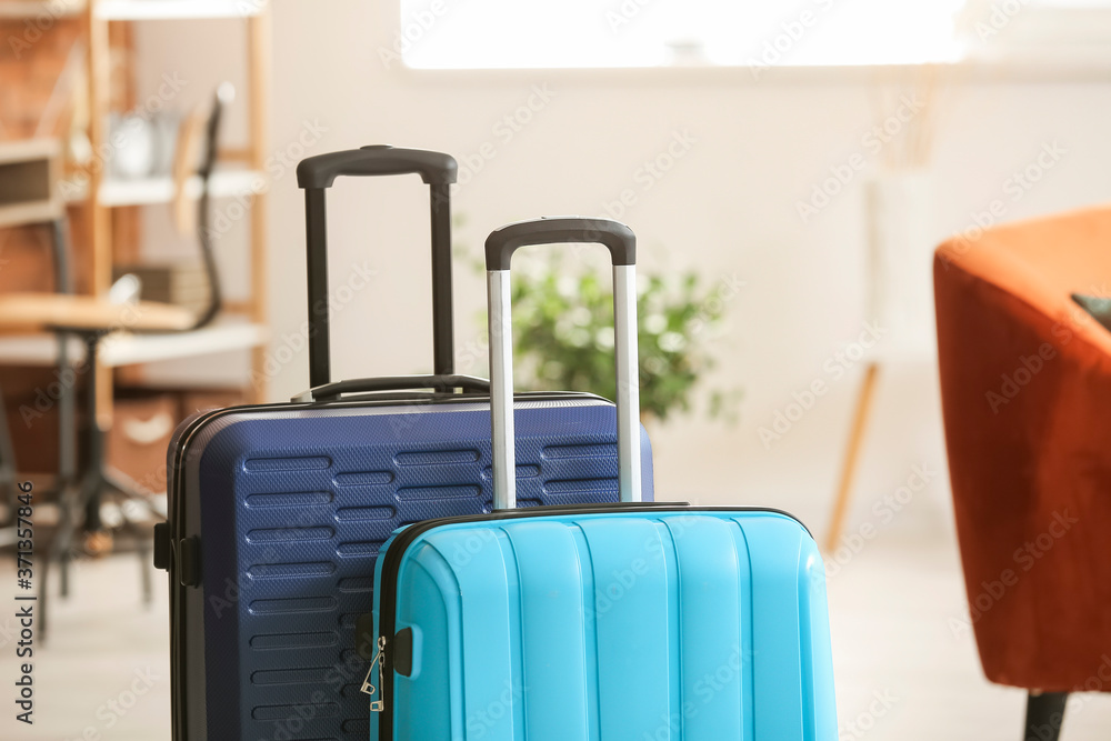 Packed suitcases at home. Travel concept Packed suitcases at home. Travel concept