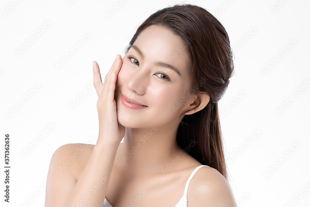 Beautiful Young asian Woman with Clean Fresh Skin, on white background, Face care, Facial treatment, Cosmetology, beauty and spa, Asian women portrait Beautiful Young asian Woman with Clean Fresh Skin, on white background, Face care, Facial treatment, Cosmetology, beauty and spa, Asian women portrait