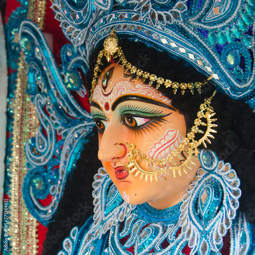 Close up of Hindu Goddess Durga idol fully ornamented