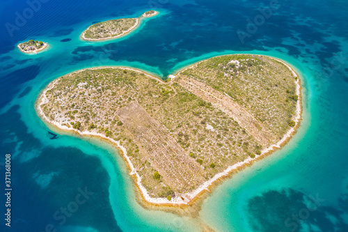 Amazing Croatia, Adriatic sea coast, aerial drone view of the heart shaped island of Galesnjak in emerald sea
